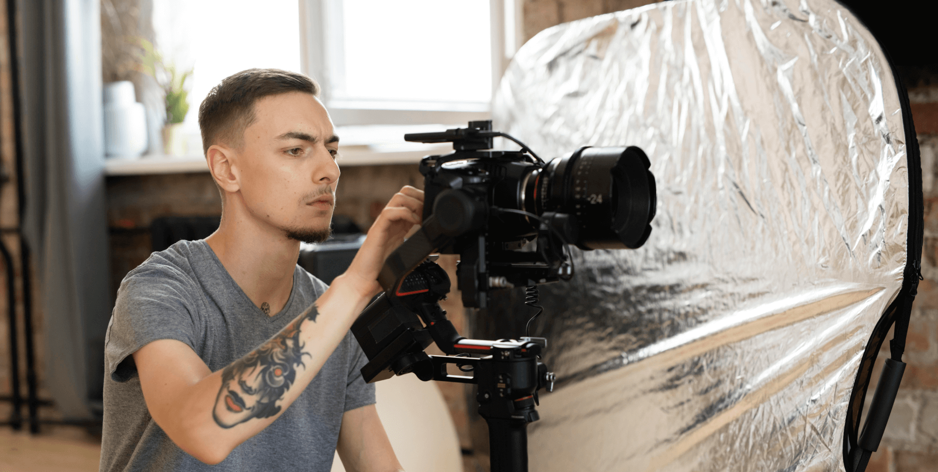 man filming with professional camera 2 (2) (1)